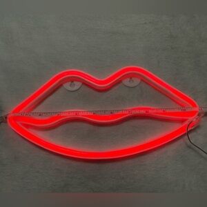 Red neon lip sign
